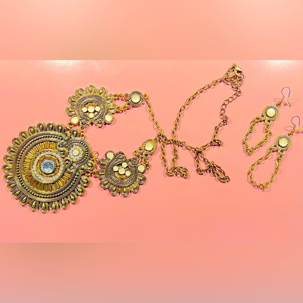 Ornate boho costume jewelry, gold necklace and earrings set